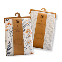 Set 2 Manteles Antimanchas Floral y Tide