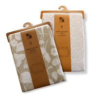 Set 2 Manteles Antimanchas Natural y Tide